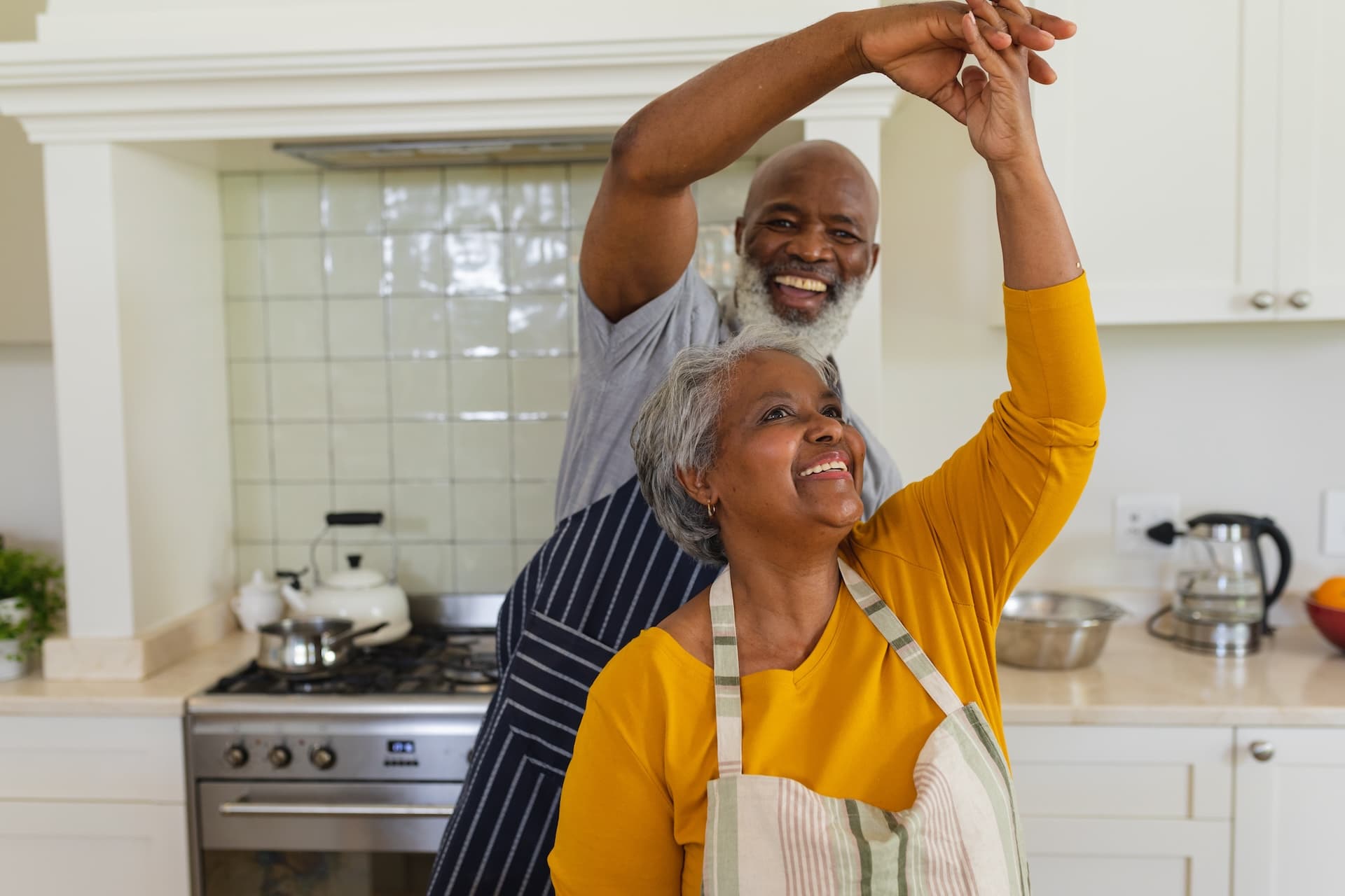 Couple dancing, hands connected doing a turn